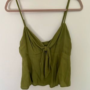 Green fitted blouse with tie front and zipper